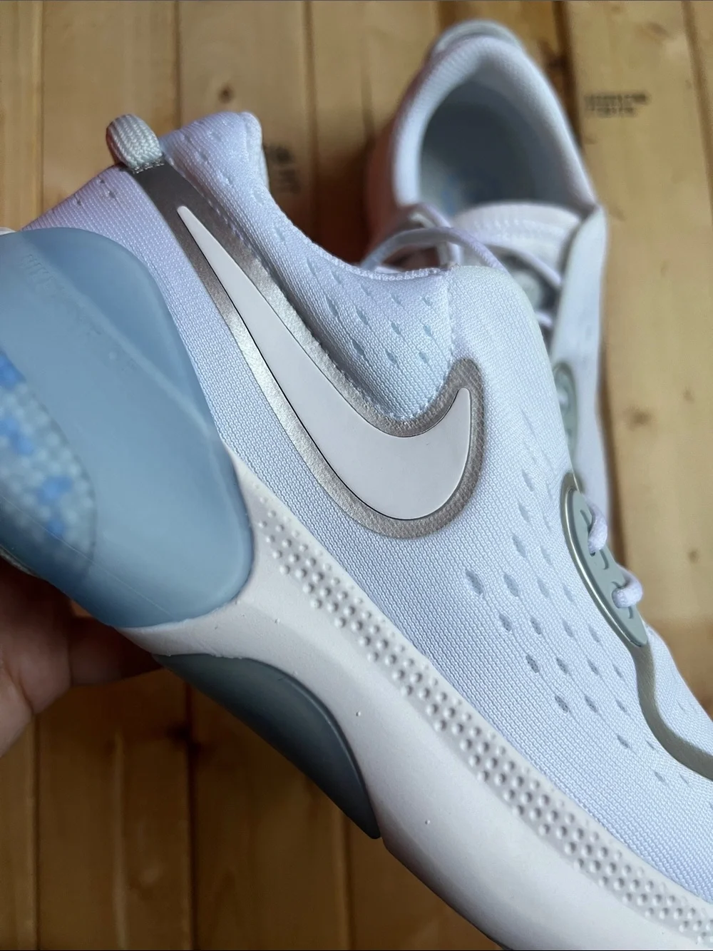 Nike Women’s White with Light Blue Accent Running Shoes